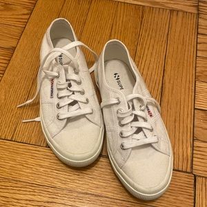White Superga sneakers.